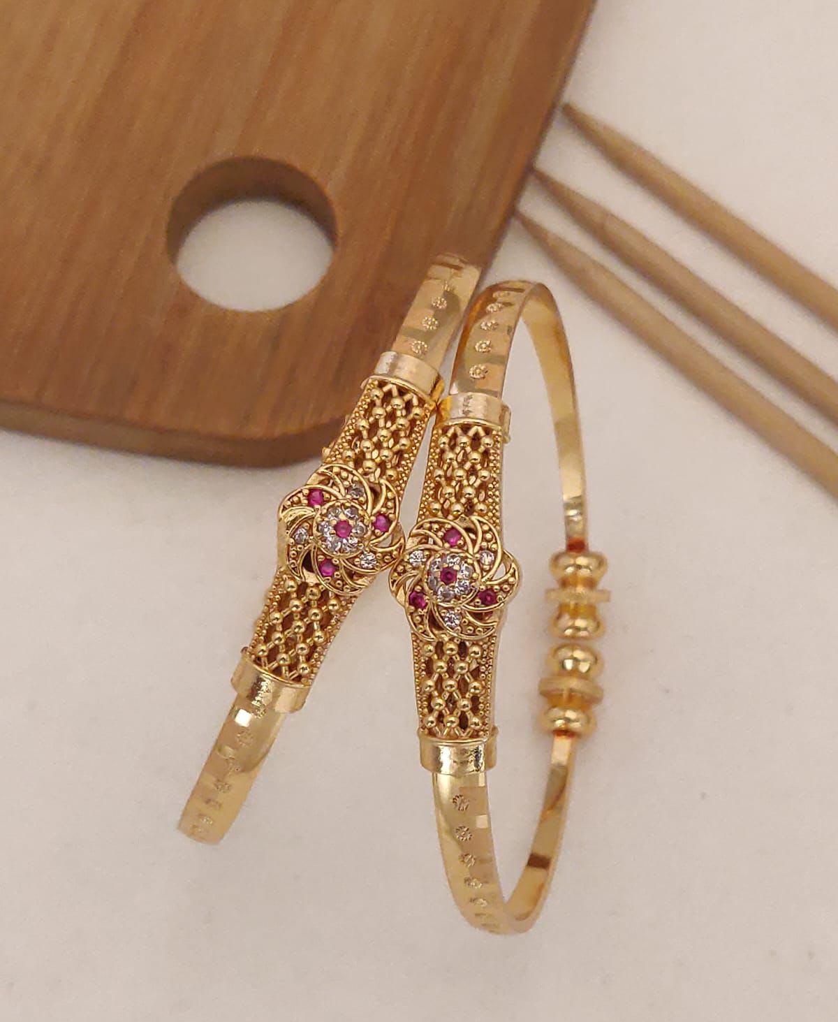 Delicate and elegant, gold plated ruby stone adjustabhgle bangles are perfect for any occasion!