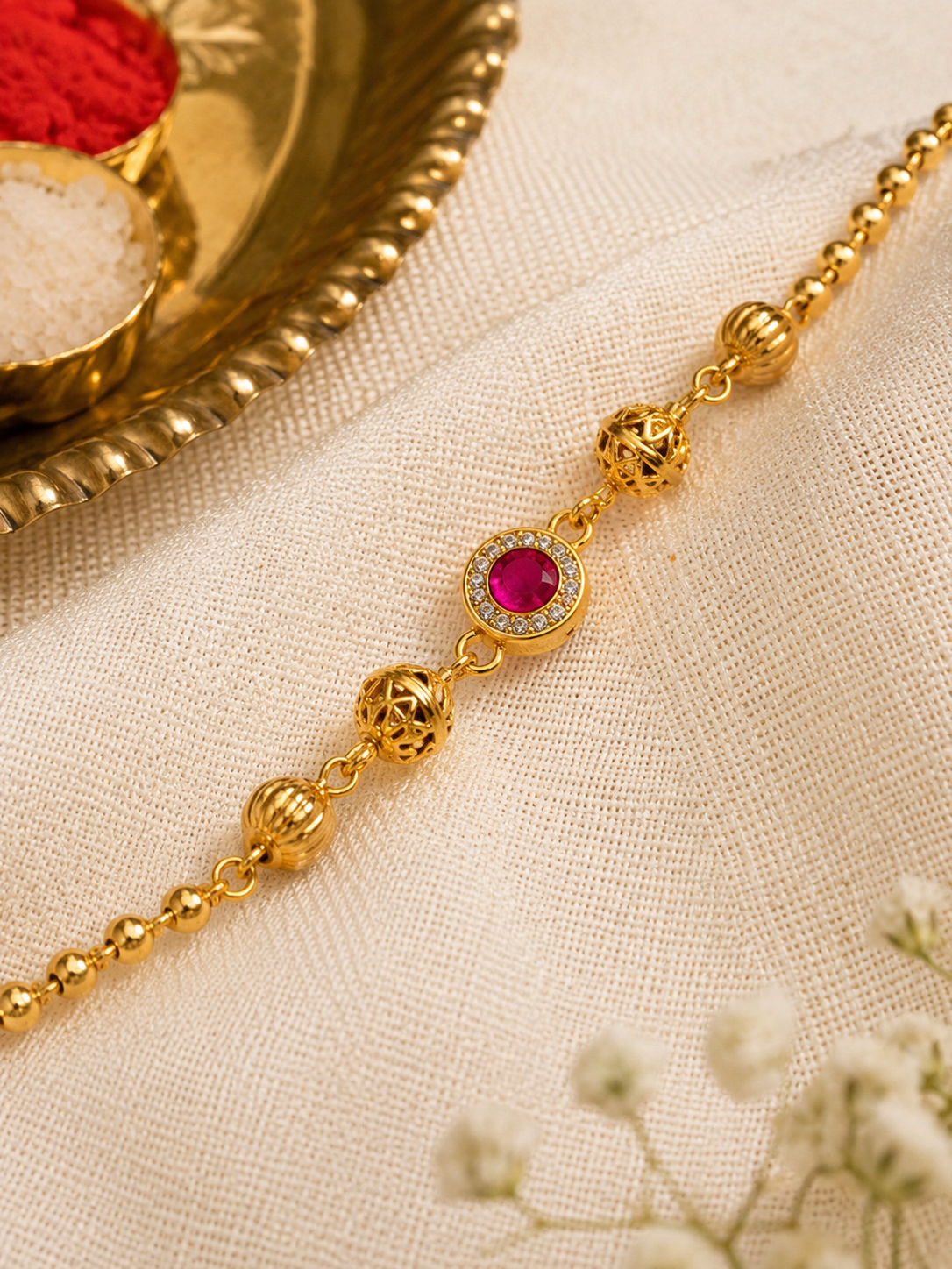 Designer Gold-Plated Ruby Stone Rakhi with American Diamond Halo | Premium Festive Raksha Bandhan Rakhi for Brother