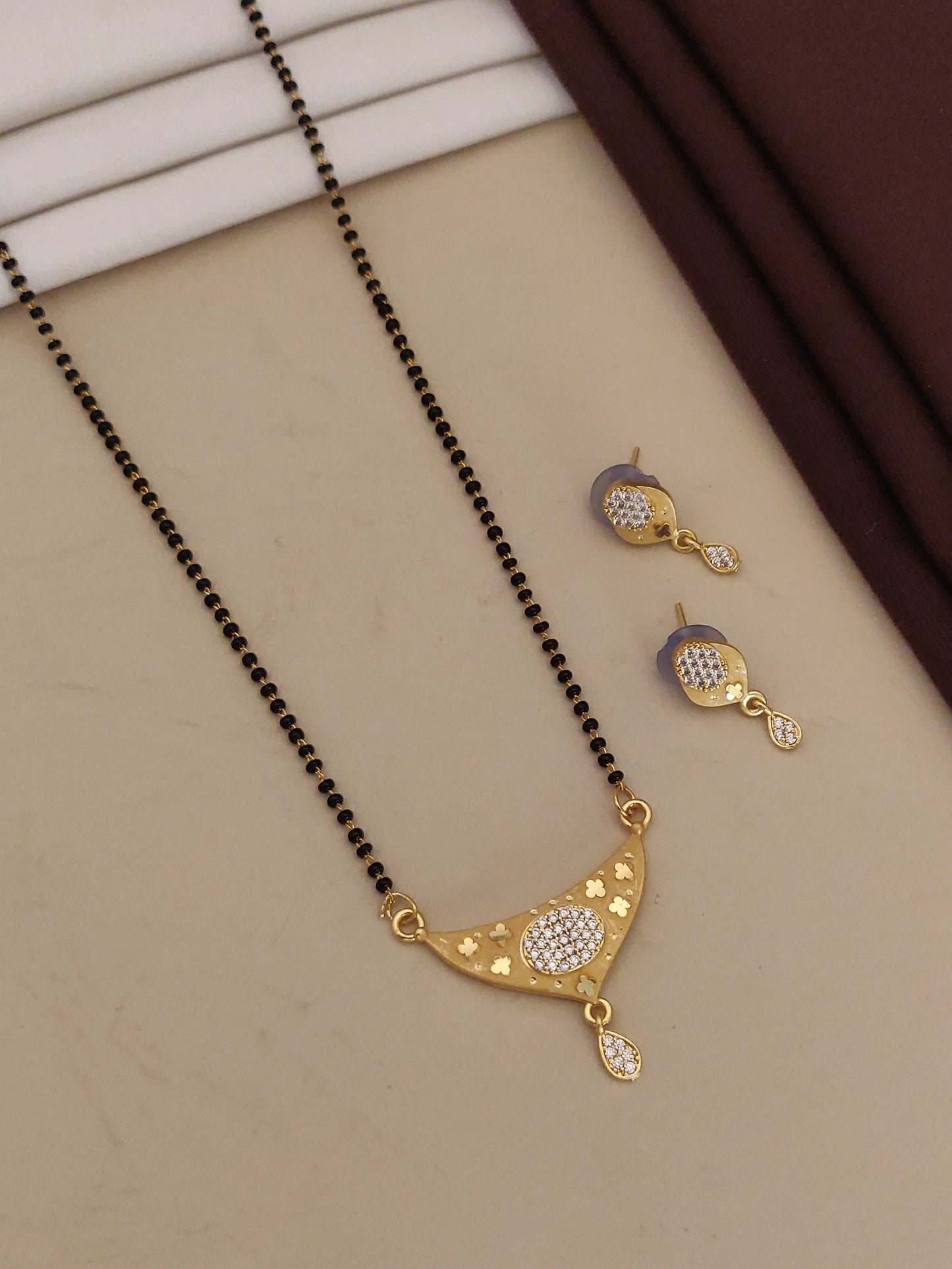 Forming ad diamond high gold plated oval mangalsutra 3 months guarantee