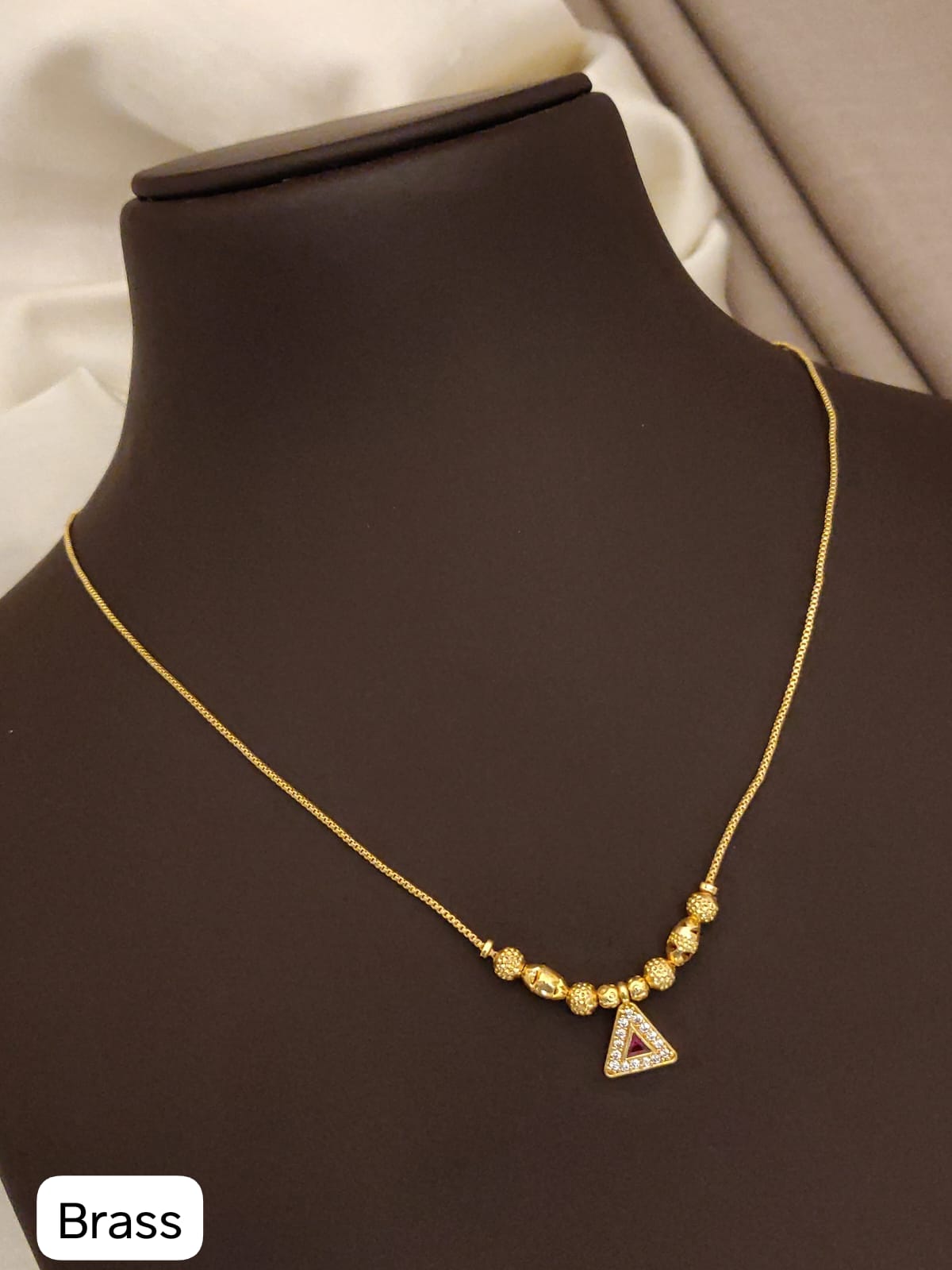 Designer Micro Gold Plated Ruby & AD Diamond Studded Traditional Necklace Set with Matching Earrings, Triangle Pendant Chain & Adjustable Ring Combo for Women