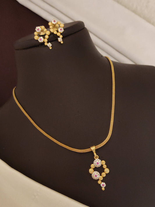 Designer high gld plated ad diamond studed fancy foring pendnet set with earring