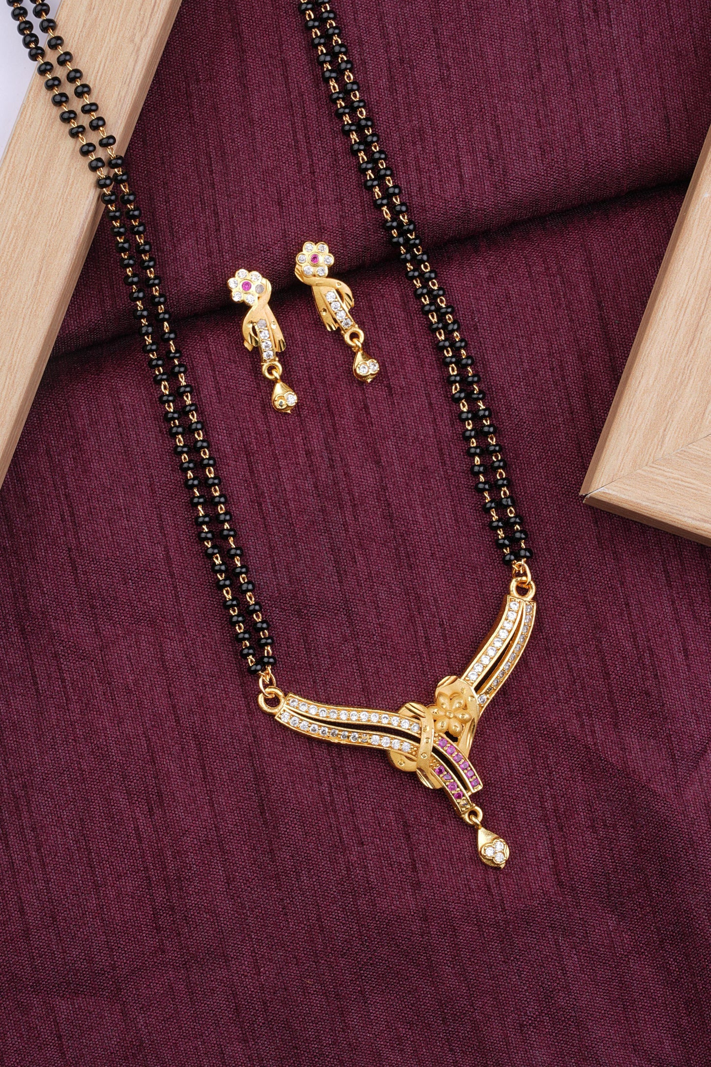 Elegant Double Line Black Beaded Mangalsutra with AD Diamond Pendant & Matching Earrings