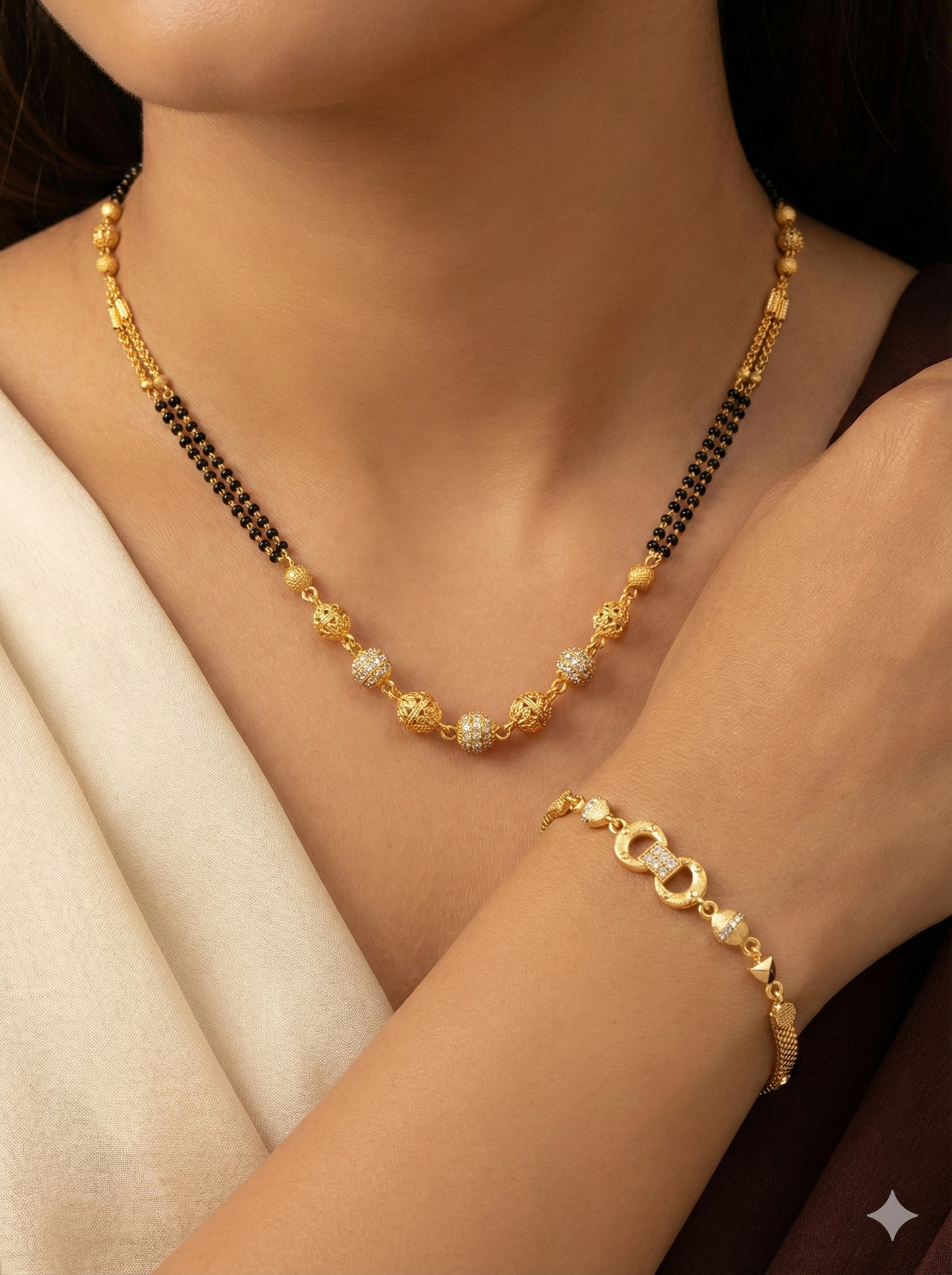 Elegant Dual Line Black Beaded Gold-Plated Mangalsutra with Designer gold  plated bracelet