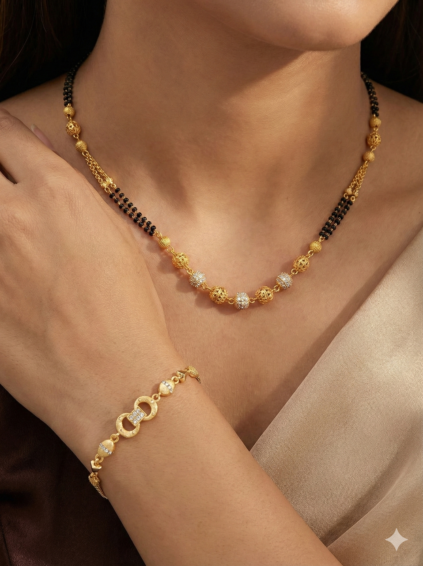 Elegant Dual Line Black Beaded Gold-Plated Mangalsutra with Designer gold  plated bracelet