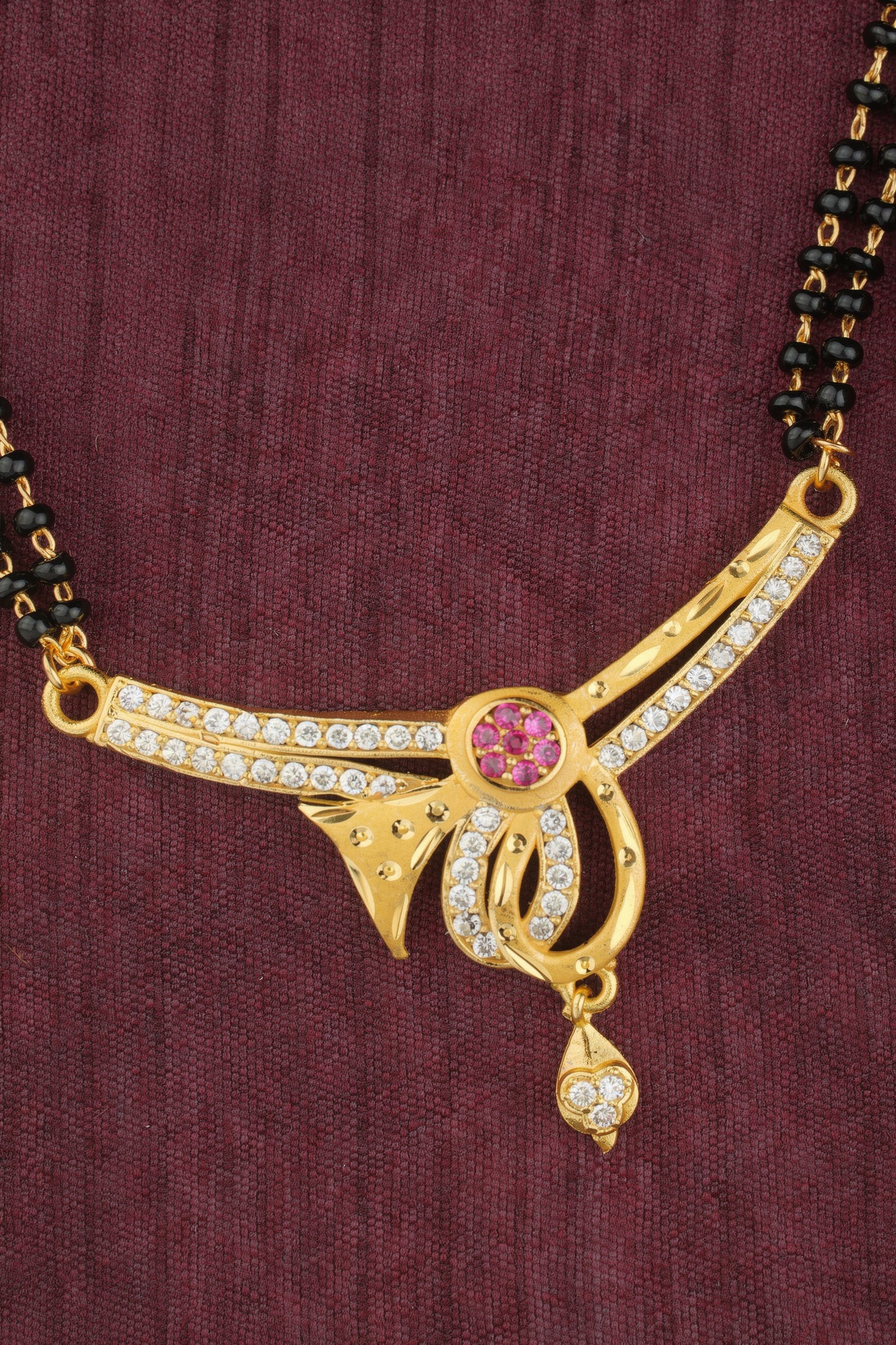 Elegant Micro Gold Plated AD Diamond 24 inches Mangalsutra with Ruby Accent Pendant and earring.