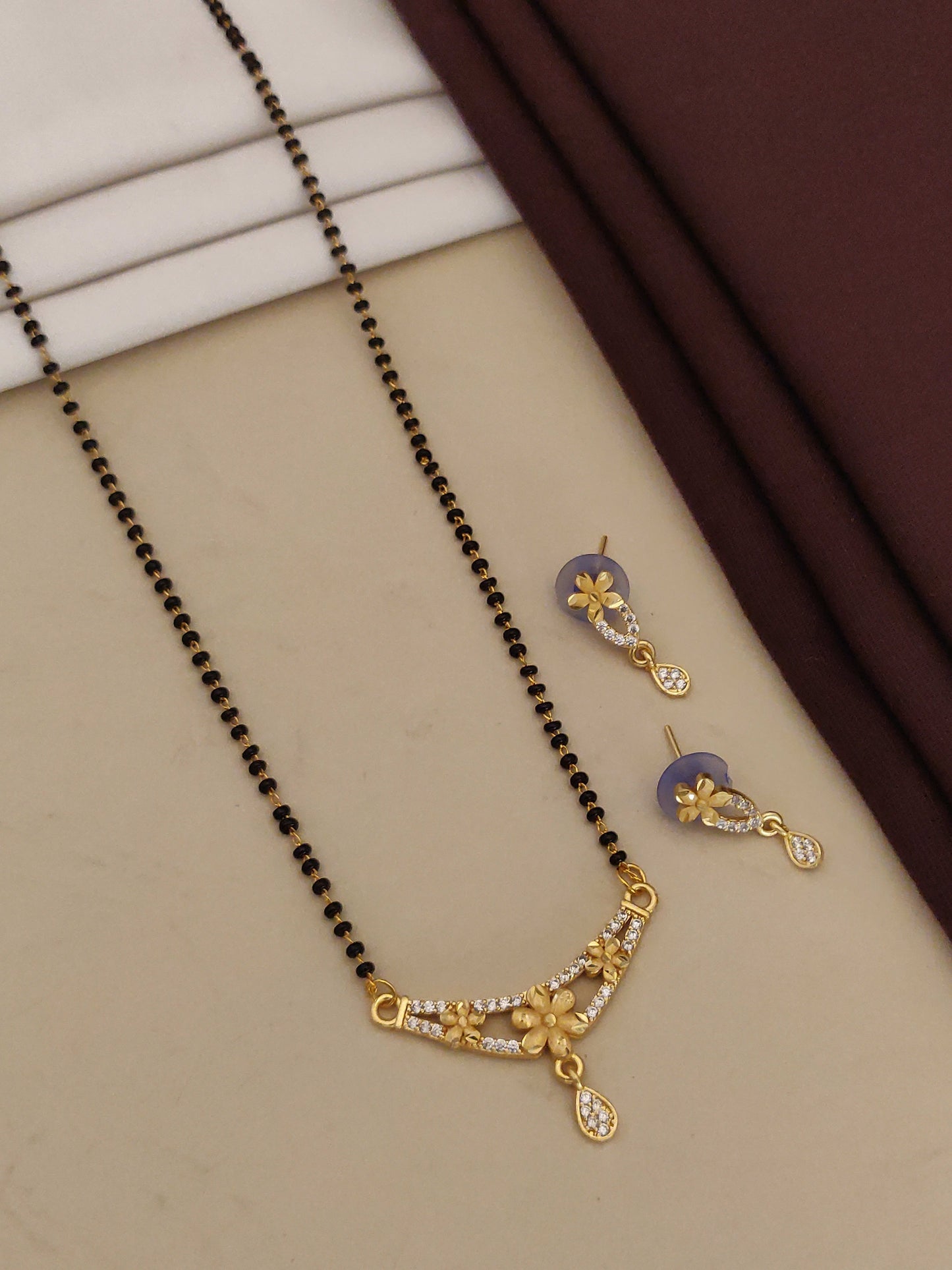 Forming ad diamond high gold plated flower mangalsutra   3 months guarantee