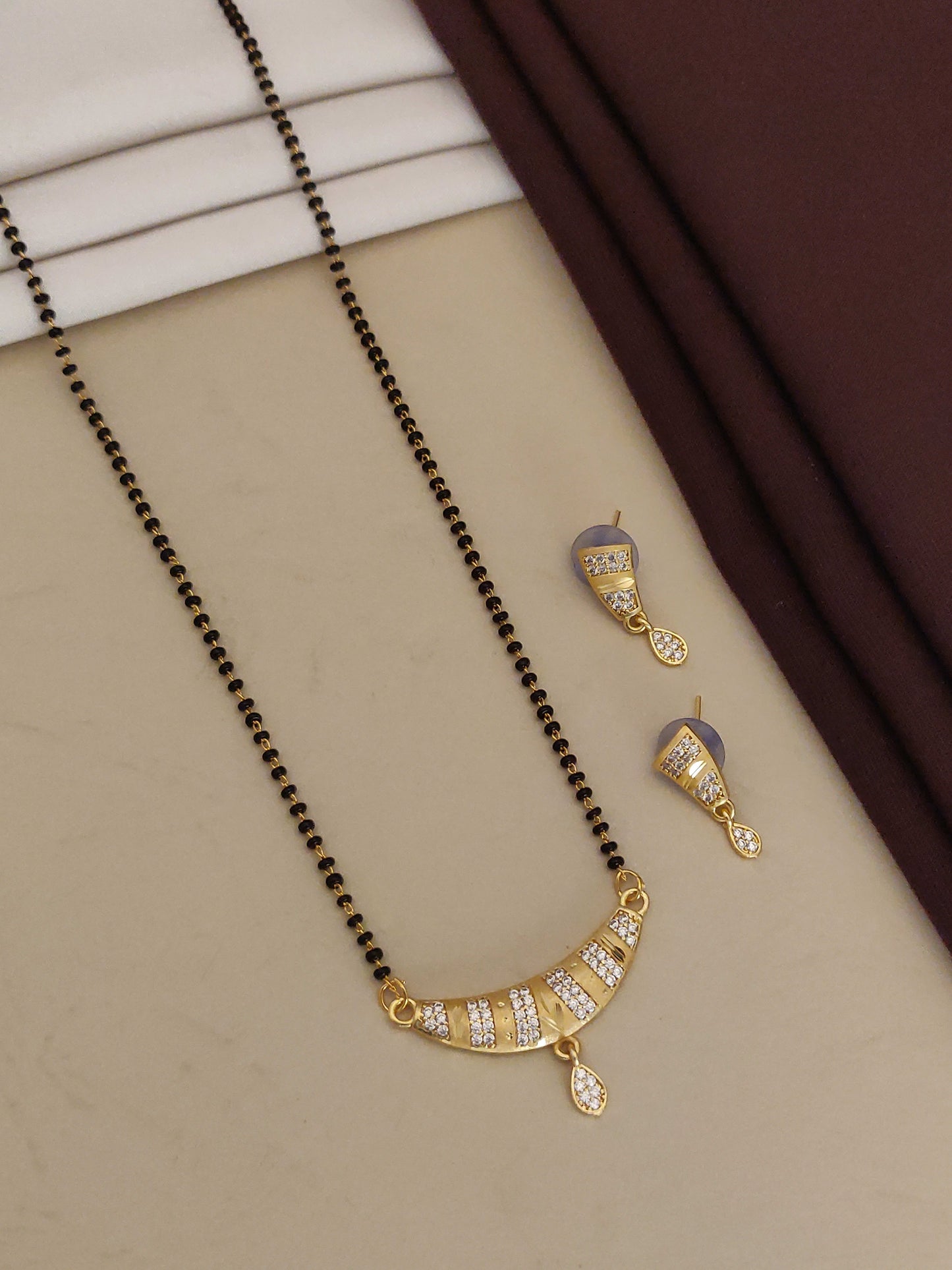 Forming ad diamond high gold plated mangalsutra   3 months guarantee