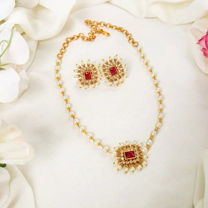 Gold plated ruby stone studed pearl chowker