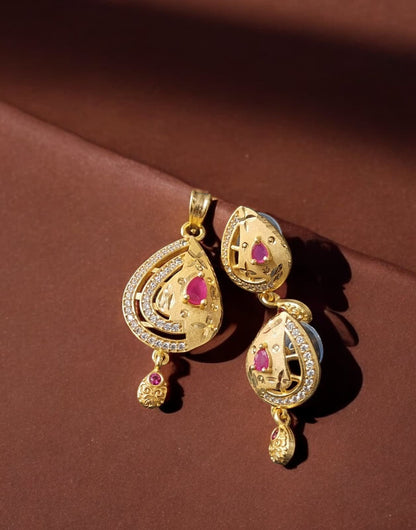 High Gold Plated Stunning American Diamond And Pink Diamond Studded Forming Designer Round Shape Pendent Set
