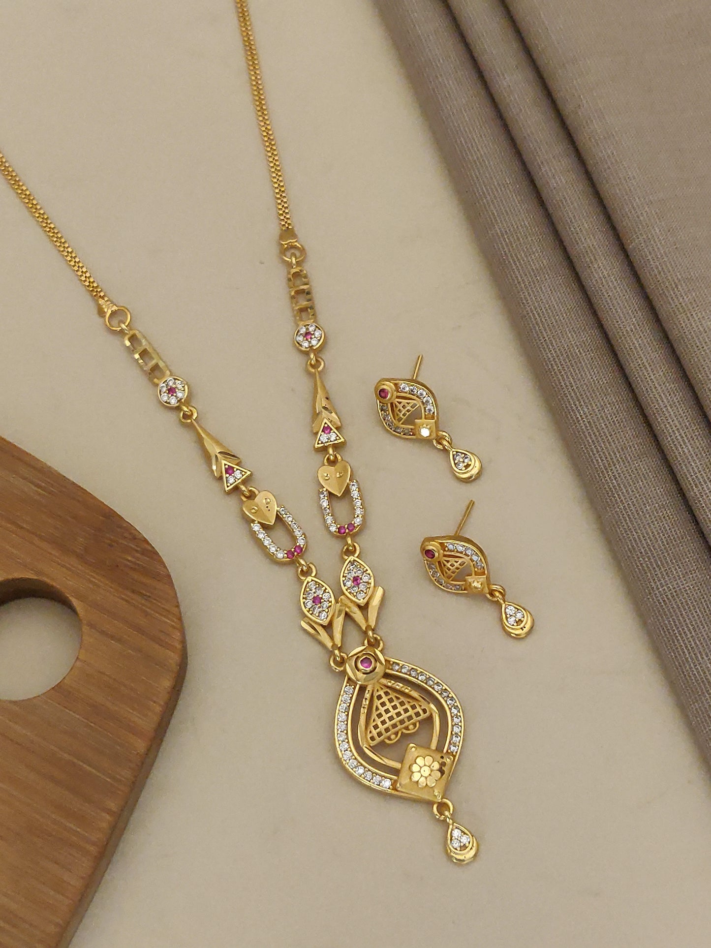Gold Plated Ad Diamond Studded Fancy Forming Necklace With Earrings For Women