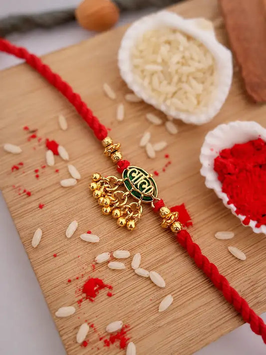 Traditional Shree Ram Gold-Plated Designer Rakhi with Red Mauli Thread