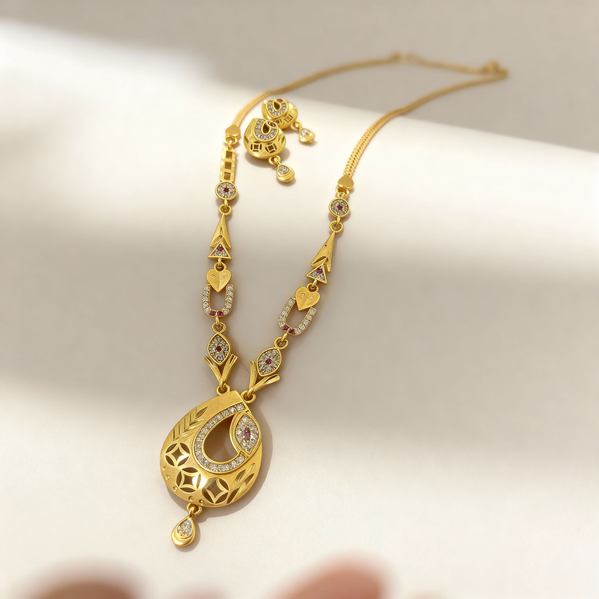 Micro Gold Plated And  Diamond Studded Fancy Oval  Pendant Set with Earring