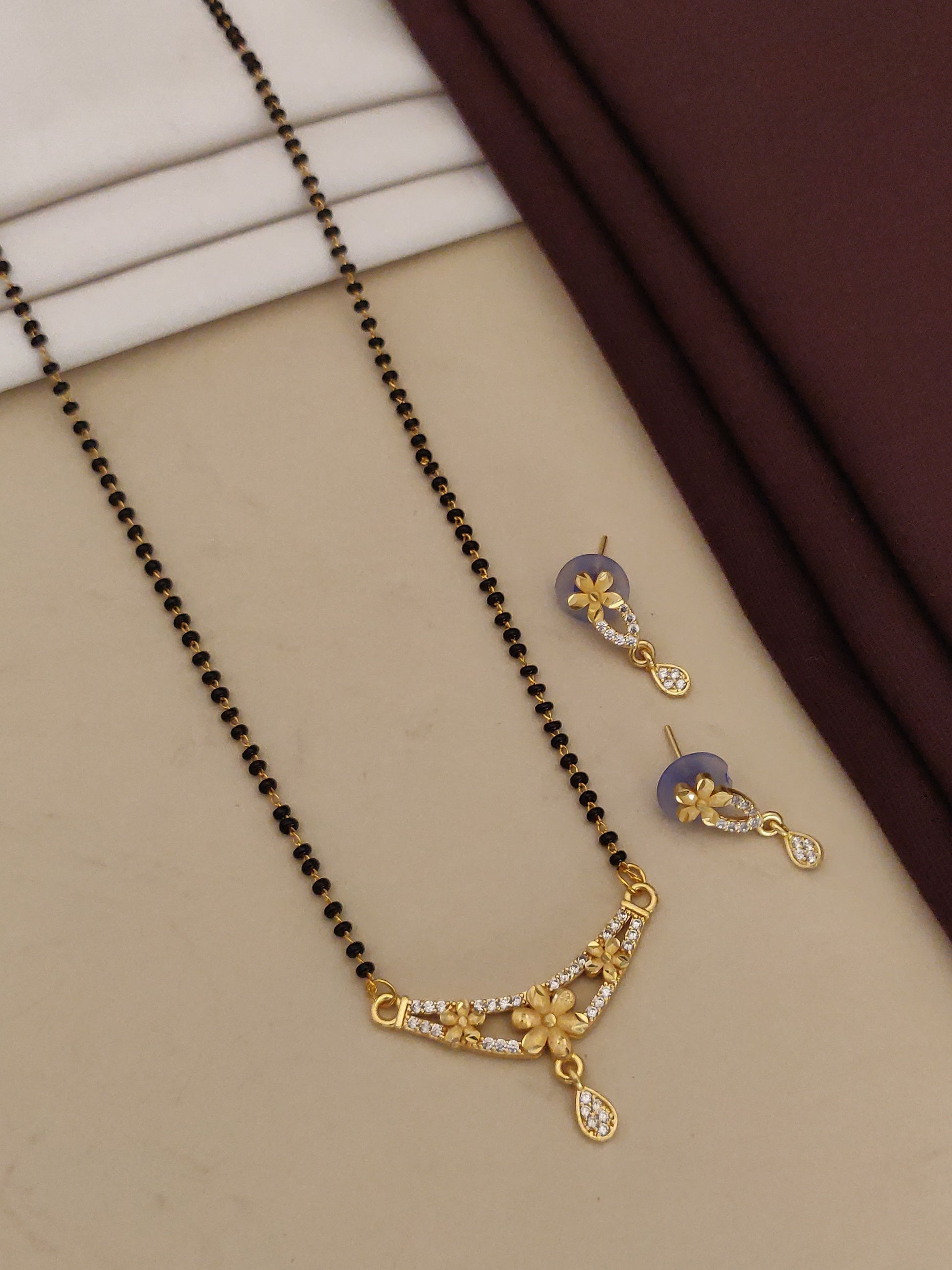 Premium Forming Flower Mangalsutra with And Diamonds And