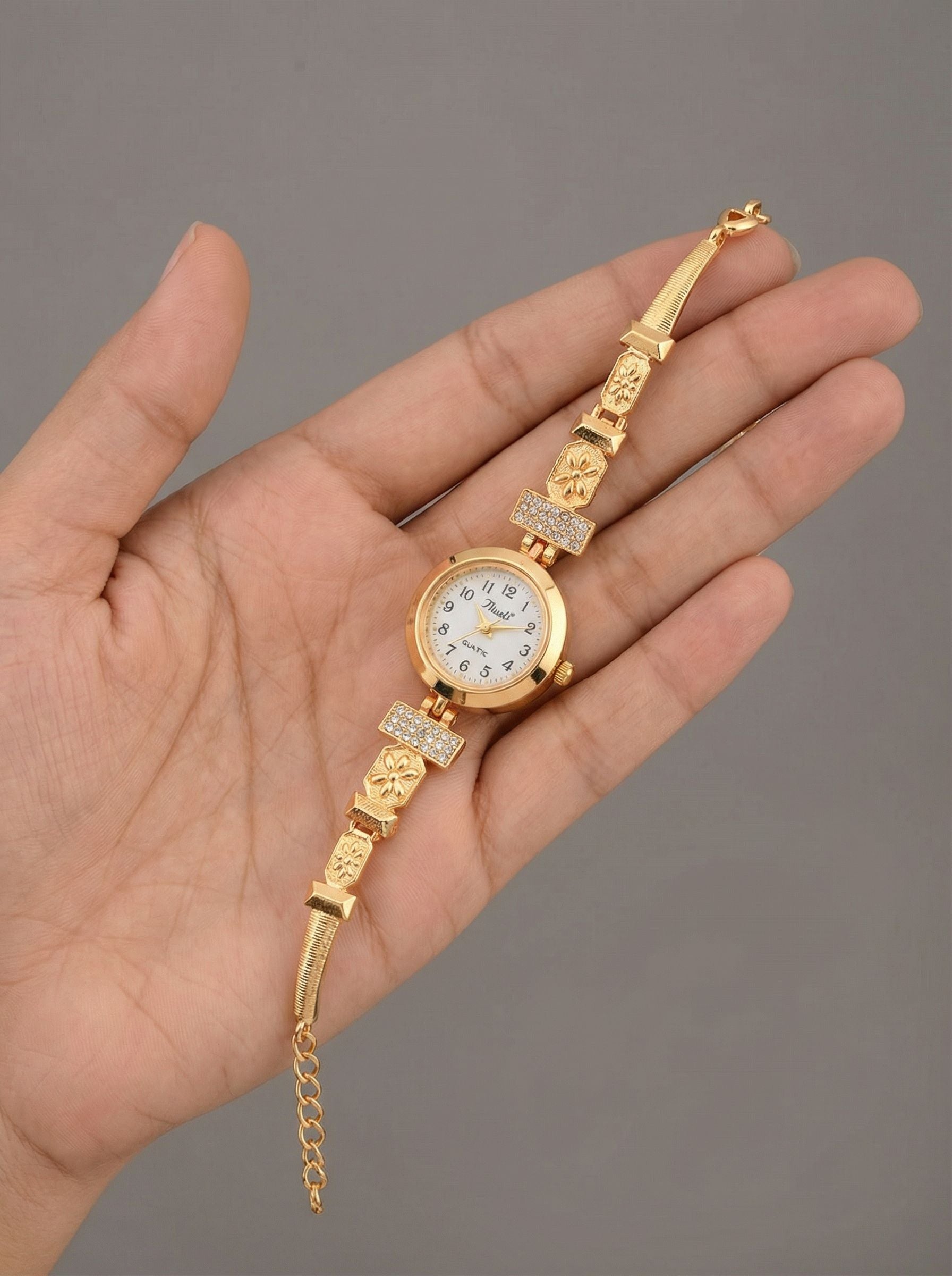 Sophisticated Gold Plated Crystal Studded Jewelry Watch For A Royal Look